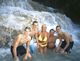 Alan, Jamie, Kim, David and Michael posing in the flow at Dunns River Falls
