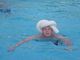 Alan with some sort of float on his head in the pool at the Wynfield Inn Hotel