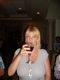 Karen sips a glass at the Italian restaurant