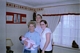 Being held by Great Nanny Ellen with Michael and Cherrie